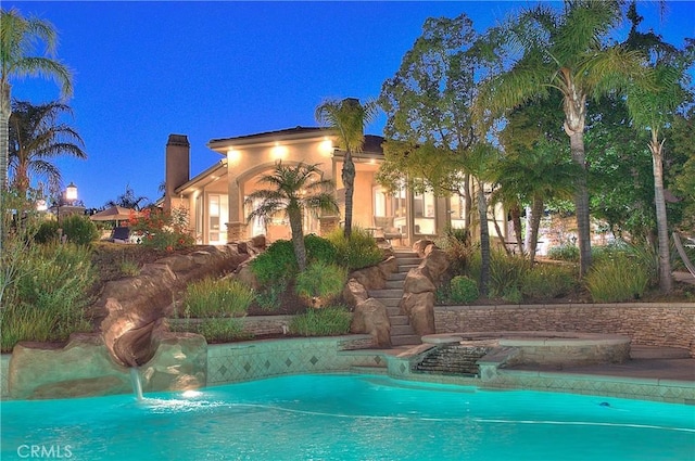 6236 Ashton Pl, Rancho Cucamonga, CA 91739 - pool at night featuring an outdoor pool