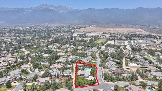 6236 Ashton Pl, Rancho Cucamonga, CA 91739 - aerial view of property and surrounding area with property parcel outlined and nearby suburban area