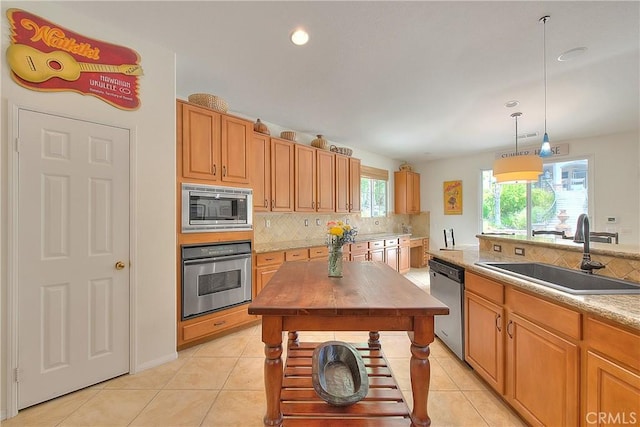 6236 Ashton Pl, Rancho Cucamonga, CA 91739 - kitchen with appliances with stainless steel finishes, decorative backsplash, light tile patterned flooring, hanging light fixtures, and light countertops