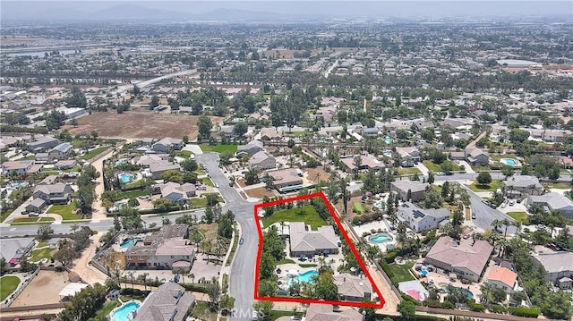 6236 Ashton Pl, Rancho Cucamonga, CA 91739 - aerial view of residential area featuring property boundaries highlighted and a pool area