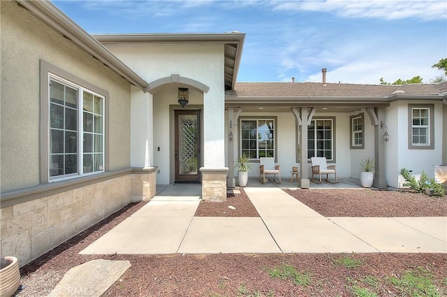 6236 Ashton Pl, Rancho Cucamonga, CA 91739 - doorway to property with covered porch and stucco siding