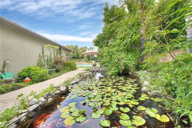 6236 Ashton Pl, Rancho Cucamonga, CA 91739 - view of home's community with a garden pond