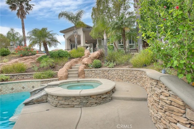 6236 Ashton Pl, Rancho Cucamonga, CA 91739 - view of community featuring a pool, a jacuzzi, and a patio