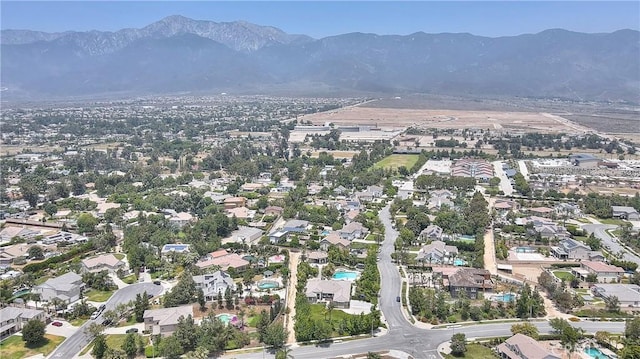 6236 Ashton Pl, Rancho Cucamonga, CA 91739 - aerial view of property's location featuring a mountainous background and nearby suburban area