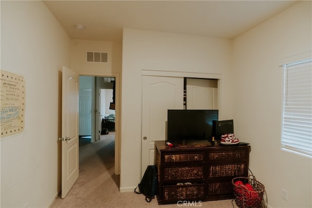635 Pegasus Dr, Merced, CA 95348 - bedroom featuring light carpet and a closet