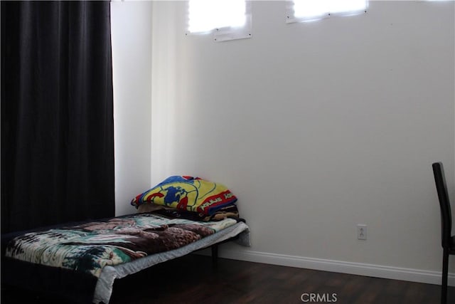 1848 Cascadian Way, San Jacinto, CA 92583 - bedroom with dark wood-style flooring and multiple windows