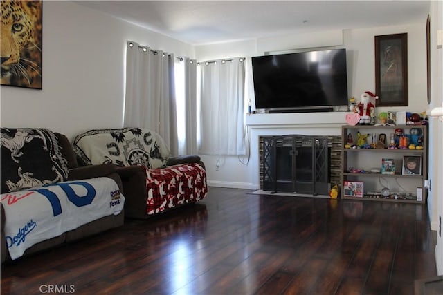 1848 Cascadian Way, San Jacinto, CA 92583 - living room with wood finished floors and a fireplace with flush hearth