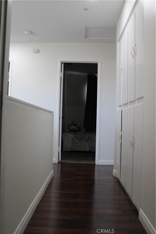 1848 Cascadian Way, San Jacinto, CA 92583 - hallway with dark wood-style floors and baseboards
