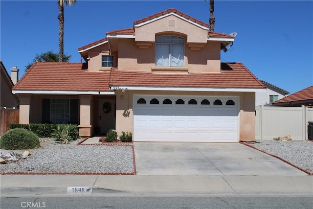 1848 Cascadian Way, San Jacinto, CA 92583 - mediterranean / spanish home with stucco siding, a tiled roof, driveway, and a garage