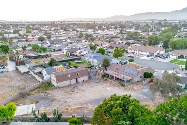 11220 Puente Way, Jurupa Valley, CA 91752 - aerial perspective of suburban area with a mountainous background