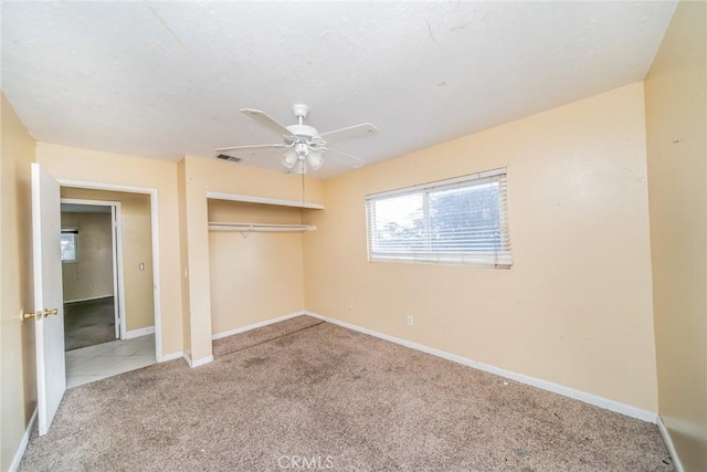 11220 Puente Way, Jurupa Valley, CA 91752 - unfurnished bedroom with carpet floors, a closet, and a ceiling fan