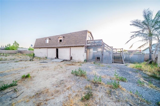 11220 Puente Way, Jurupa Valley, CA 91752 - rear view of property featuring stairs and a shingled roof