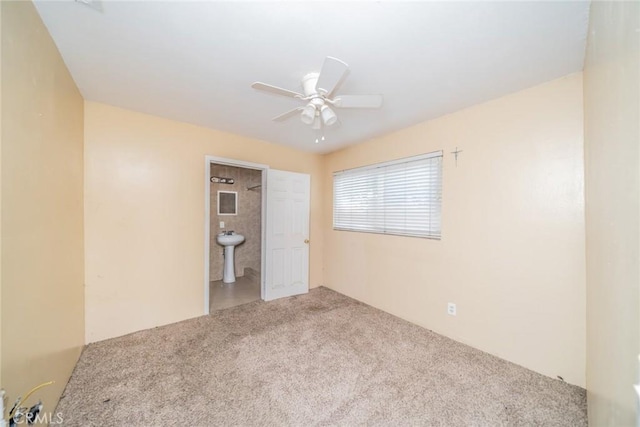 11220 Puente Way, Jurupa Valley, CA 91752 - unfurnished bedroom featuring carpet flooring, ensuite bathroom, and ceiling fan