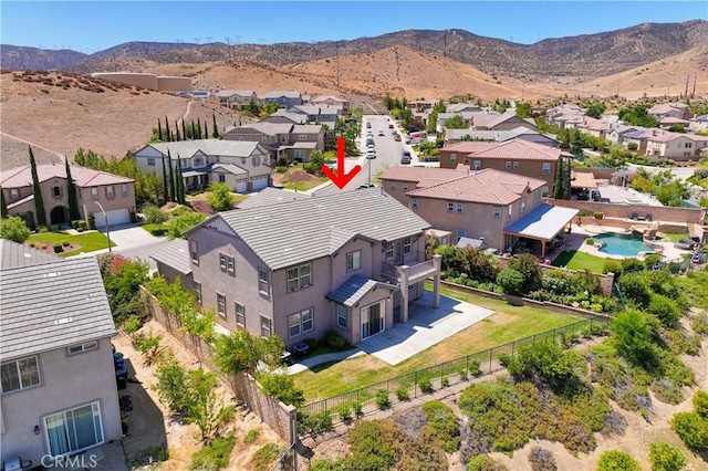 37351 Paintbrush Dr, Palmdale, CA 93551 - aerial perspective of suburban area with a mountainous background and a pool area
