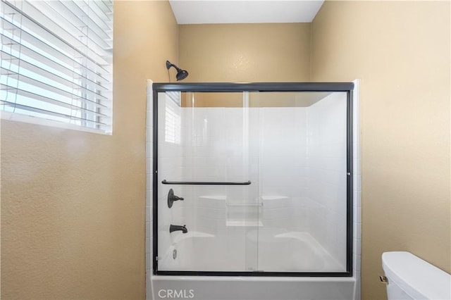 37351 Paintbrush Dr, Palmdale, CA 93551 - full bath featuring shower / bath combination with glass door and a textured wall