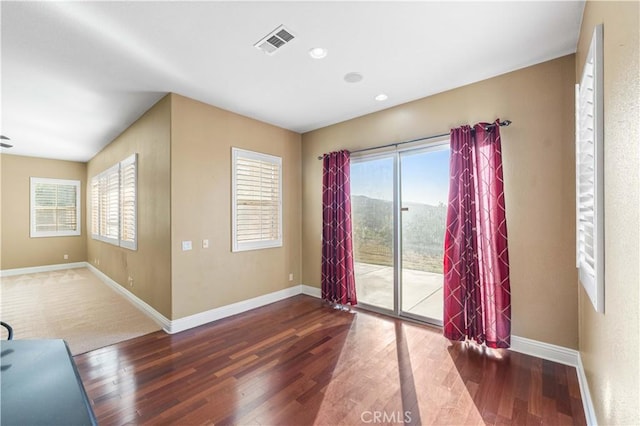 37351 Paintbrush Dr, Palmdale, CA 93551 - empty room featuring wood finished floors, healthy amount of natural light, and recessed lighting