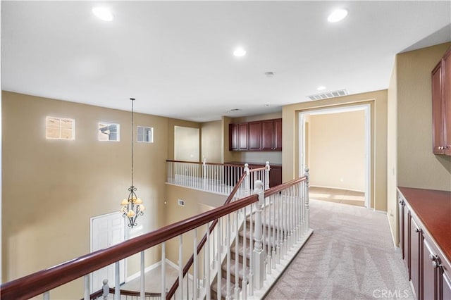 37351 Paintbrush Dr, Palmdale, CA 93551 - hall with an upstairs landing, recessed lighting, and light carpet
