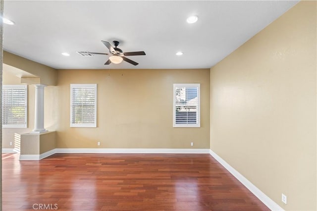 37351 Paintbrush Dr, Palmdale, CA 93551 - spare room with decorative columns, wood finished floors, ceiling fan, and recessed lighting