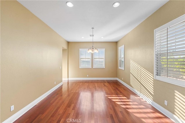 37351 Paintbrush Dr, Palmdale, CA 93551 - unfurnished dining area featuring a chandelier, wood finished floors, and recessed lighting