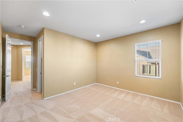 37351 Paintbrush Dr, Palmdale, CA 93551 - spare room featuring light carpet, recessed lighting, and a smoke detector