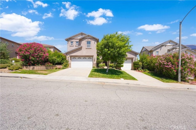 37351 Paintbrush Dr, Palmdale, CA 93551 - traditional-style home featuring driveway, a residential view, stucco siding, and an attached garage
