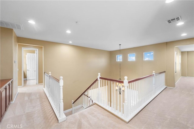 37351 Paintbrush Dr, Palmdale, CA 93551 - corridor with an upstairs landing, light carpet, and recessed lighting