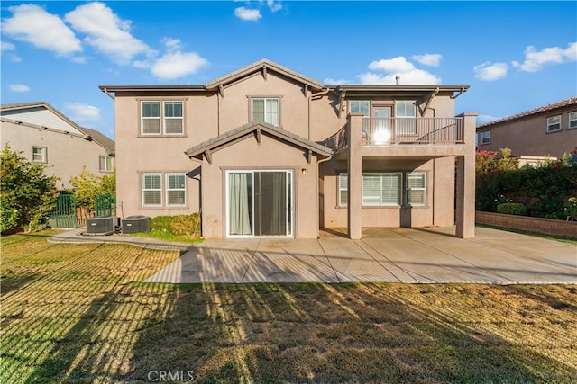 37351 Paintbrush Dr, Palmdale, CA 93551 - back of house with a balcony, stucco siding, and a patio