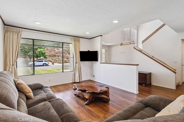 42724 Santa Suzanne Pl, Temecula, CA 92592 - living room with a textured ceiling, wood finished floors, recessed lighting, and stairway