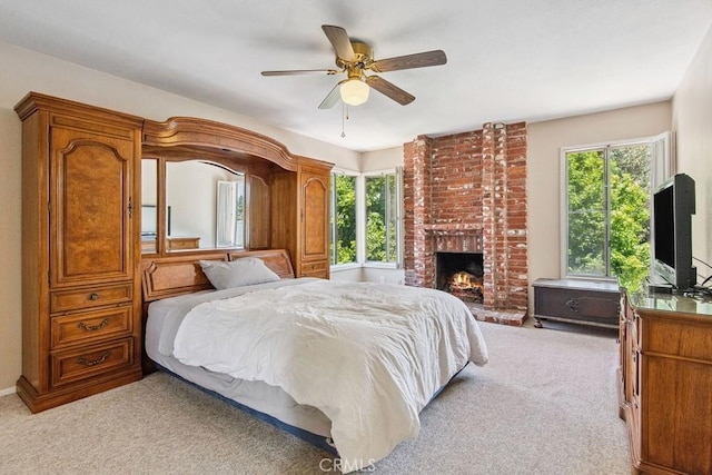 42724 Santa Suzanne Pl, Temecula, CA 92592 - bedroom featuring light colored carpet, multiple windows, and a brick fireplace