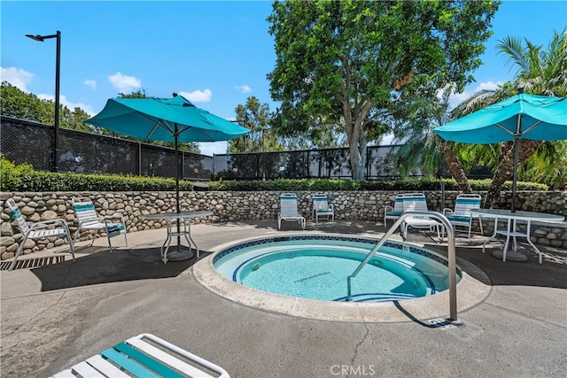 3639 Country Oaks Loop Unit E, Ontario, CA 91761 - view of swimming pool featuring a hot tub and a patio