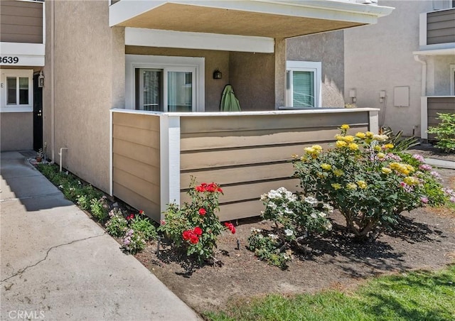 3639 Country Oaks Loop Unit E, Ontario, CA 91761 - doorway to property with stucco siding