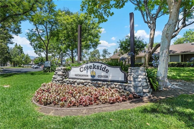 3639 Country Oaks Loop Unit E, Ontario, CA 91761 - community / neighborhood sign featuring a yard