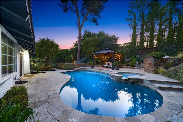 170 Buckthorn Dr, Brea, CA 92823 - pool at dusk with a gazebo, a patio, and a pool with connected hot tub