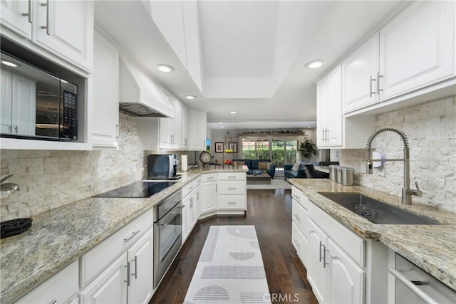 170 Buckthorn Dr, Brea, CA 92823 - kitchen featuring black appliances, backsplash, white cabinetry, recessed lighting, and open floor plan