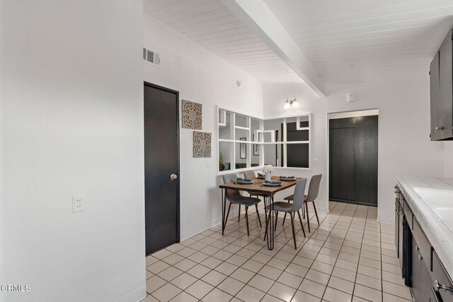 17002 E Nubia St, Covina, CA 91722 - dining area featuring beam ceiling and light tile patterned floors