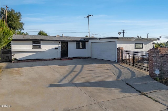 17002 E Nubia St, Covina, CA 91722 - ranch-style home with an attached garage, concrete driveway, and stucco siding