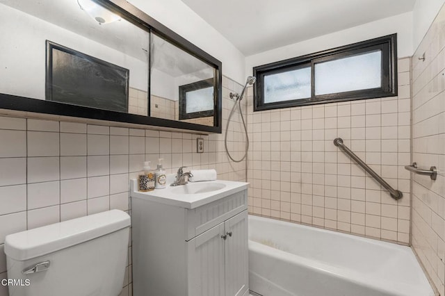 17002 E Nubia St, Covina, CA 91722 - bathroom with vanity, tile walls, washtub / shower combination, and decorative backsplash