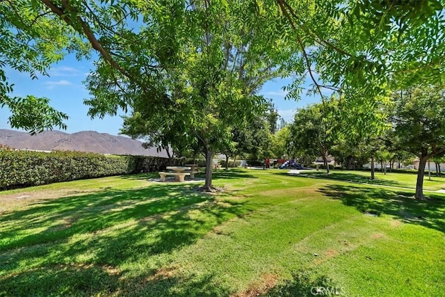 27185 Buffalo Trl, Corona, CA 92883 - view of home's community with a yard and a mountain view
