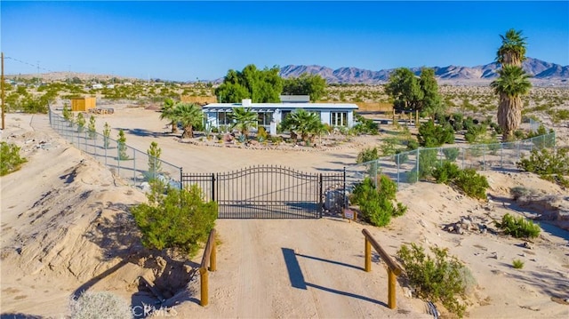 72160 Winters Rd Unit 29, Palms, CA 92277 - gate with a mountain view, view of desert, and a view of rural / pastoral area