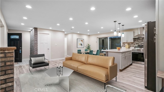 72160 Winters Rd Unit 29, Palms, CA 92277 - living area featuring light wood-type flooring and recessed lighting