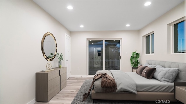 72160 Winters Rd Unit 29, Palms, CA 92277 - bedroom with access to outside, light wood finished floors, and recessed lighting
