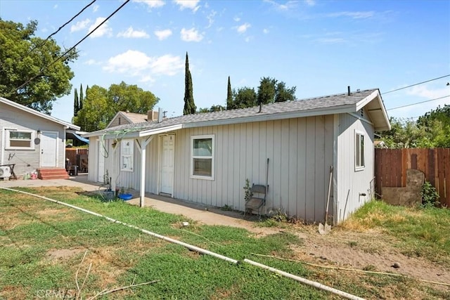 2838 N G St, San Bernardino, CA 92405 - back of house with entry steps and roof with shingles