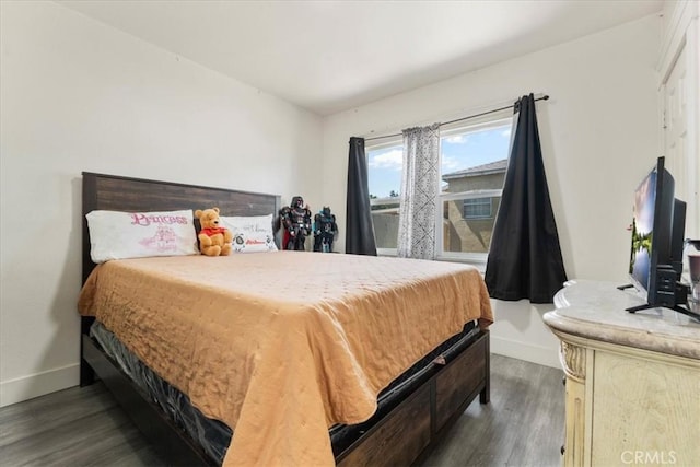 2838 N G St, San Bernardino, CA 92405 - bedroom with dark wood-style floors and baseboards