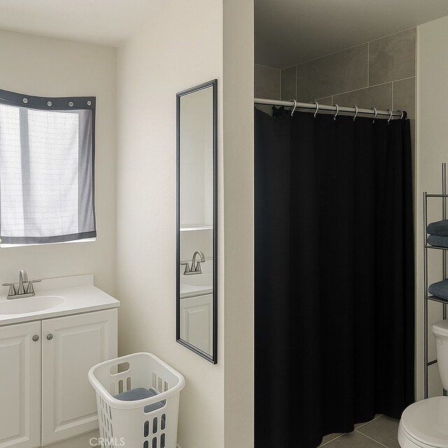 2838 N G St, San Bernardino, CA 92405 - bathroom featuring a shower with shower curtain, vanity, and tile patterned flooring
