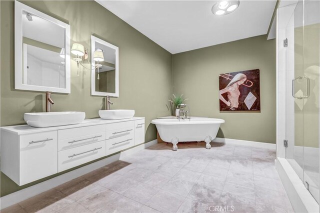 5333 Zelzah Ave Unit 203, Encino, CA 91316 - full bathroom with double vanity, a stall shower, and a freestanding bath
