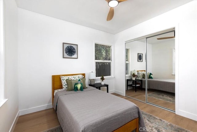 5447 Columbus Ave, Sherman Oaks, CA 91411 - bedroom featuring wood finished floors, a closet, and a ceiling fan