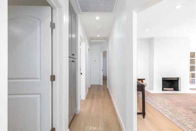 5447 Columbus Ave, Sherman Oaks, CA 91411 - corridor with light wood finished floors and recessed lighting