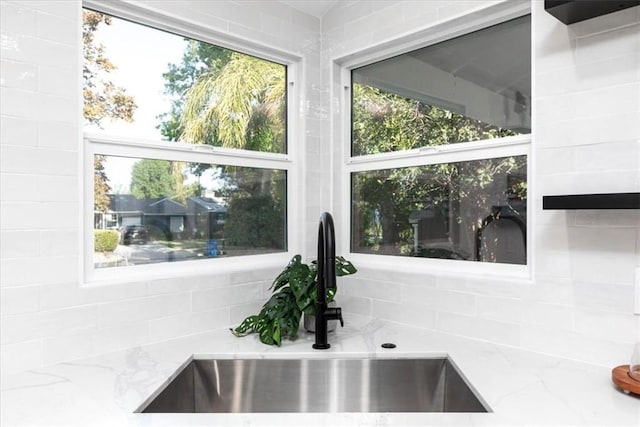 5447 Columbus Ave, Sherman Oaks, CA 91411 - kitchen view of light stone counters and decorative backsplash