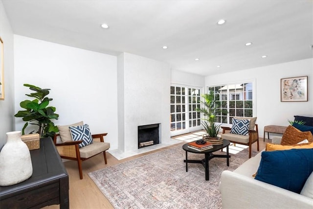 5447 Columbus Ave, Sherman Oaks, CA 91411 - living area with recessed lighting, wood finished floors, and a fireplace