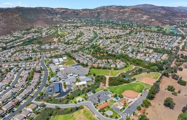 23763 Aspen, Murrieta, CA 92562 - aerial view of property's location featuring a mountain backdrop and nearby suburban area